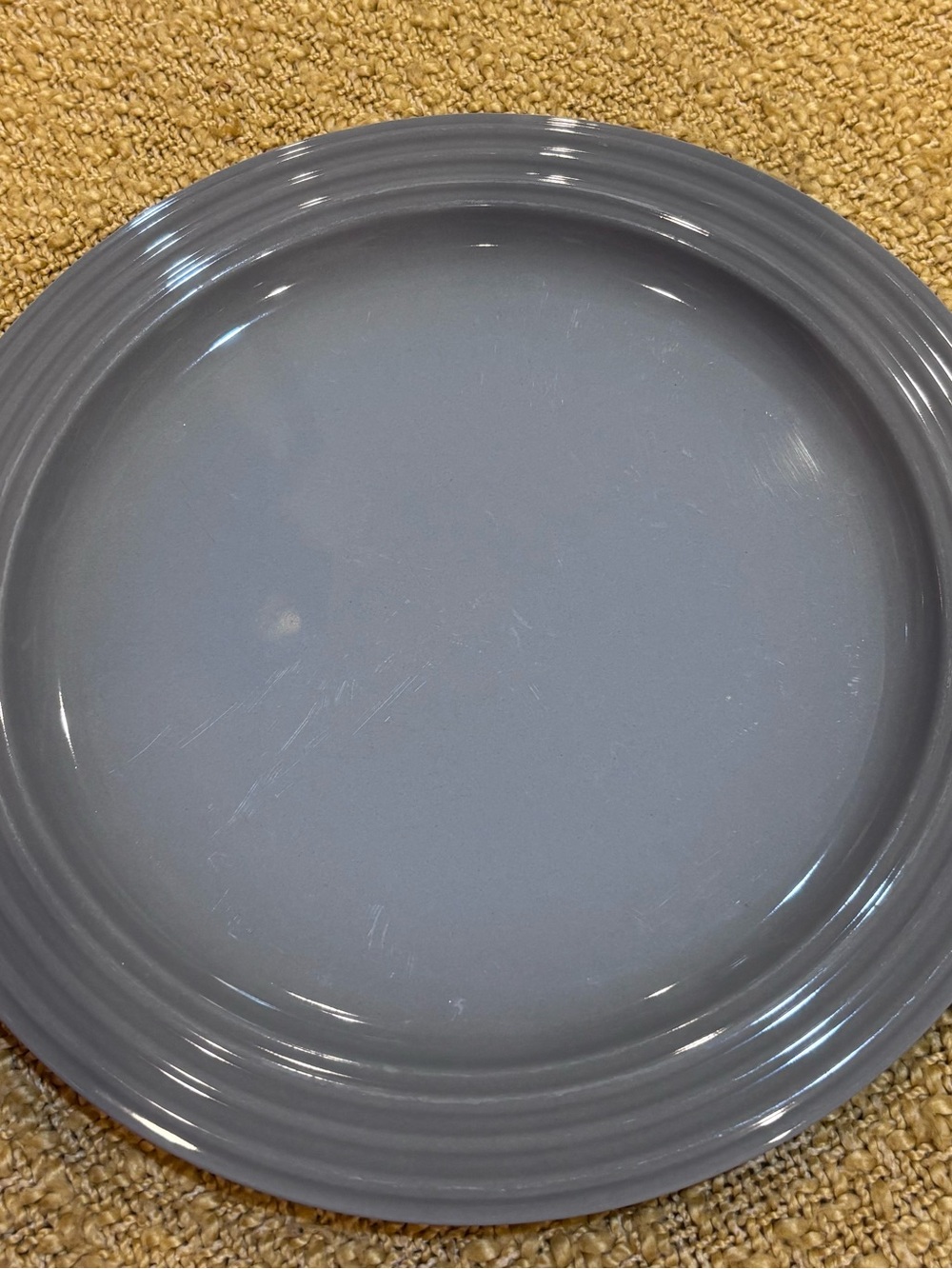 Le Creuset Dinner Plate 10.5 inches. Gray. Good used condition.